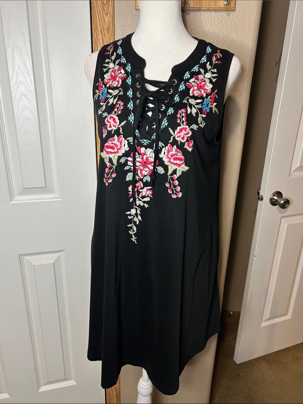 Andre by Unit Black Sleeveless Lace-Up Mini Dress with Pink Floral Embroidery